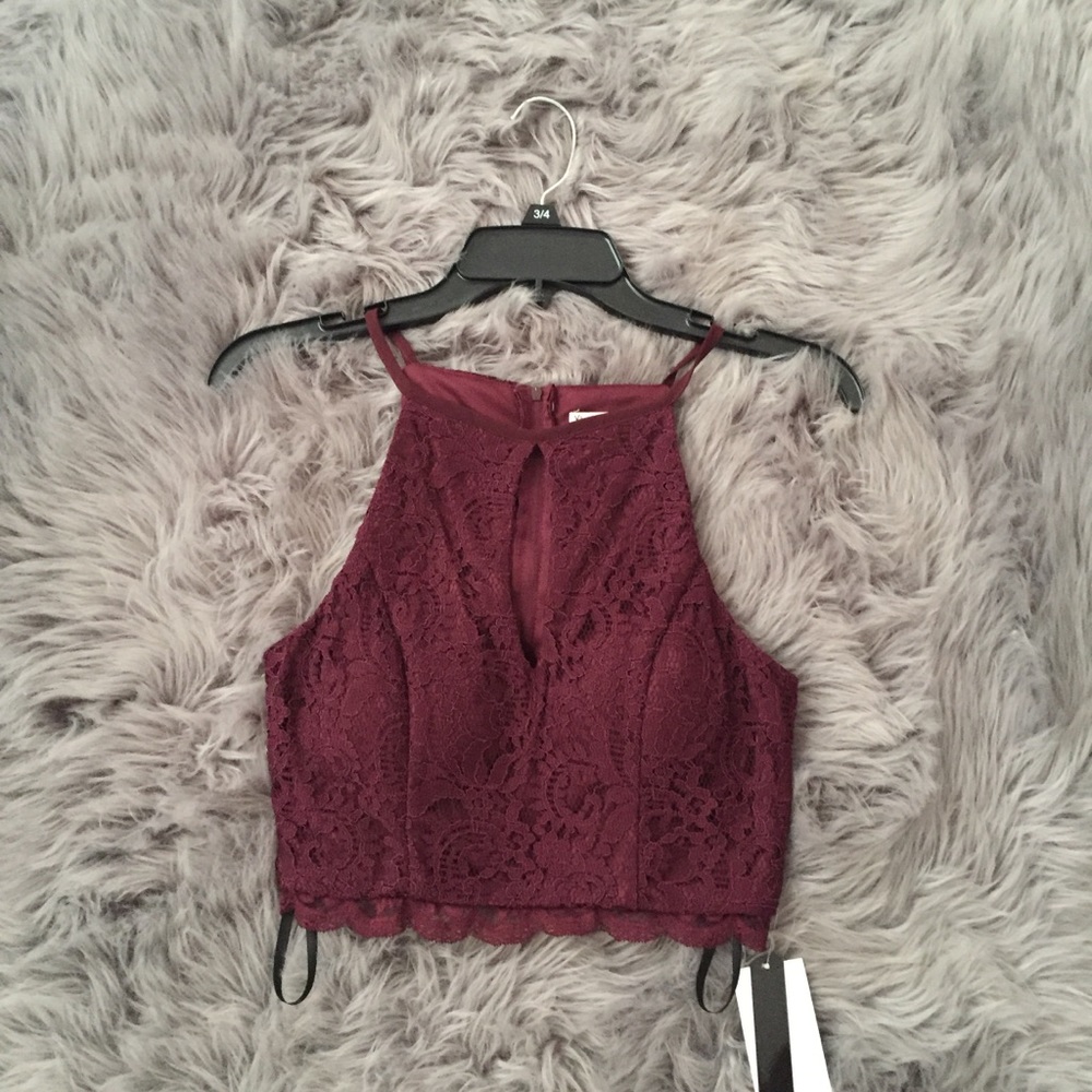 Burgundy top. New with tags. Was $69